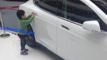 5-year-old kid hits baby in a Tesla Model S