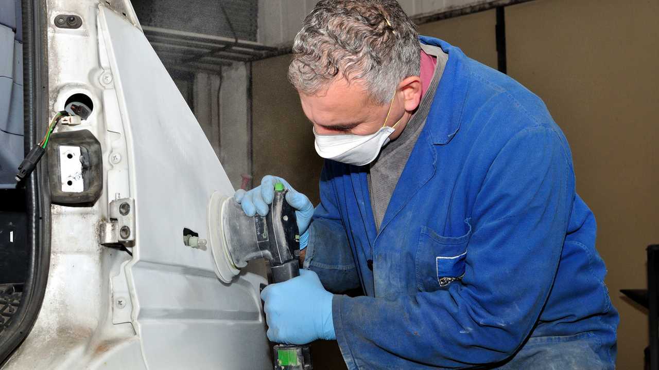 Van collisison damage being repaired in body shop