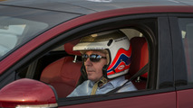 Jaguar XJR races man on jet pack