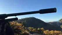 My Christensen Arms Ridgeline FFT with a Banish suppressor and tape over the barrel to stop water ingress.