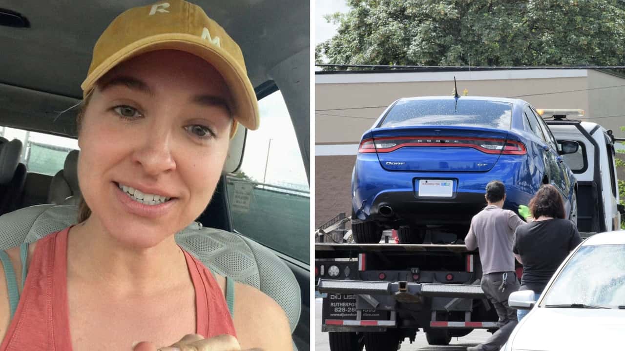 woman gets her car towed in front