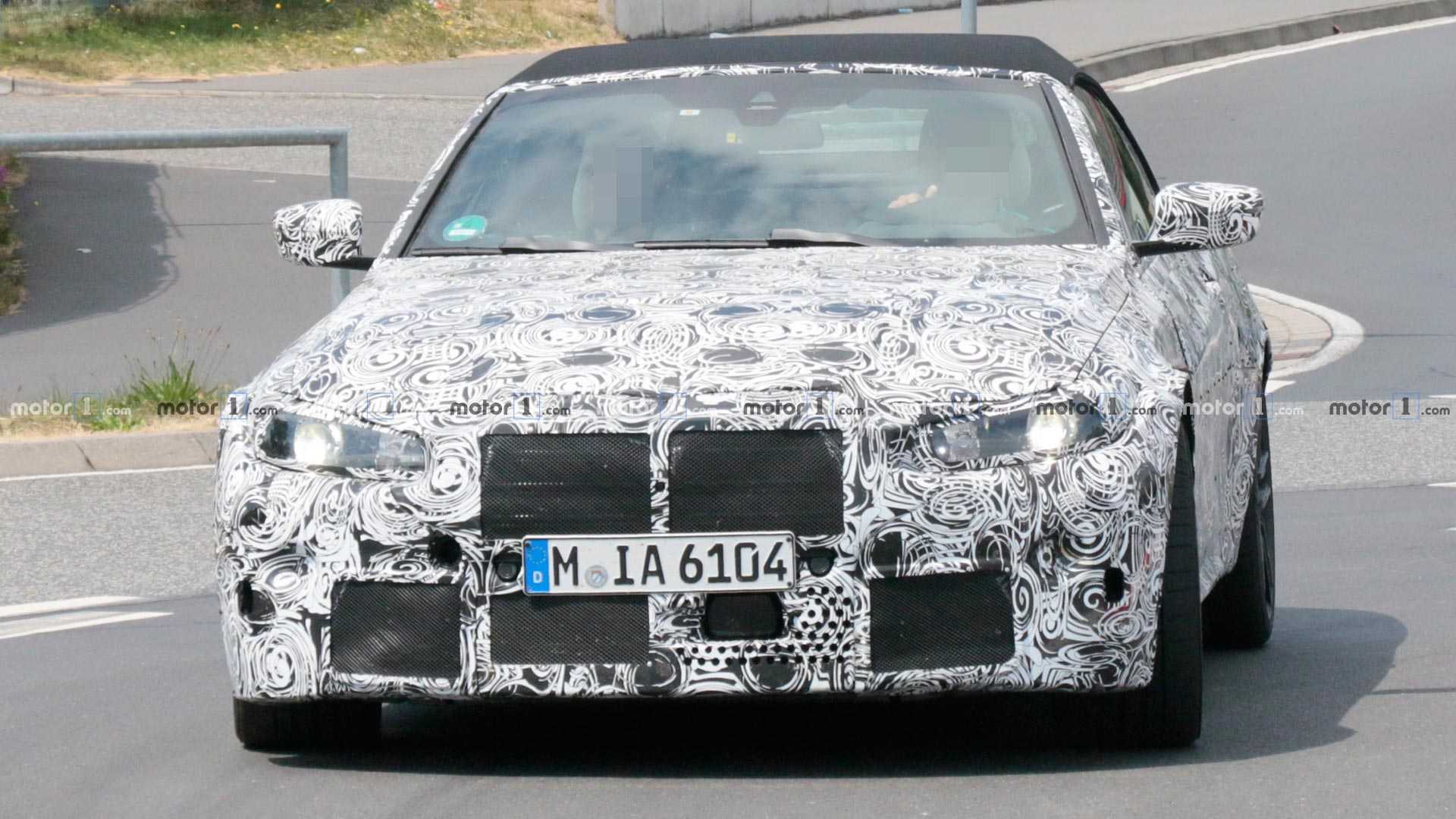 https://cdn.motor1.com/images/mgl/8LJYP/s1/bmw-m4-cabriolet-spy-shots.jpg bmw-m4-cabriolet-spy-shots