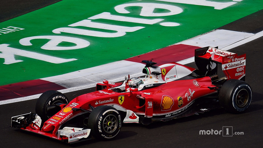 Sebastian Vettel, Ferrari SF16-H waves to the crowd at the end of the race
