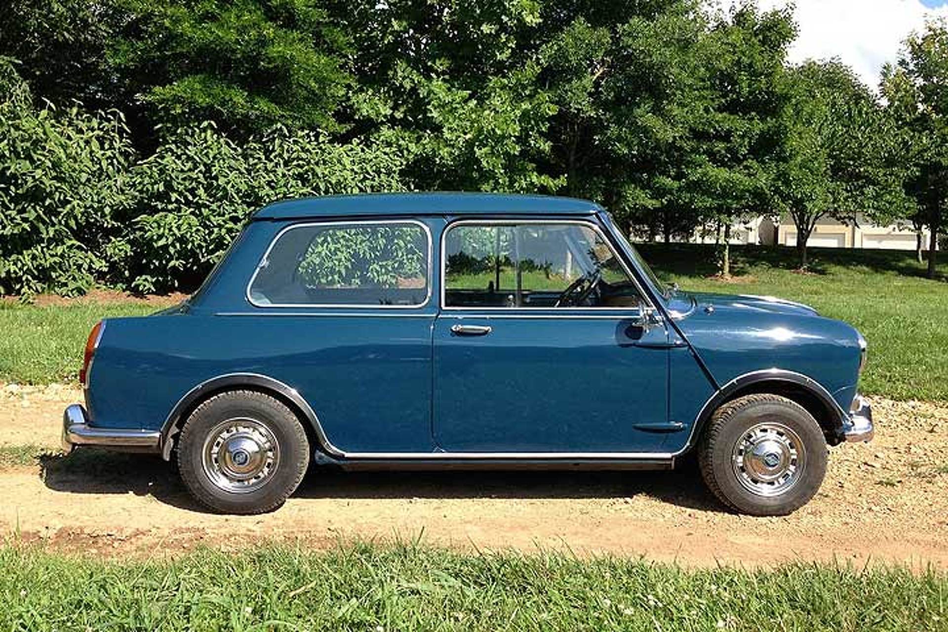 This Dainty British Sedan Hides a Honda VTEC Secret