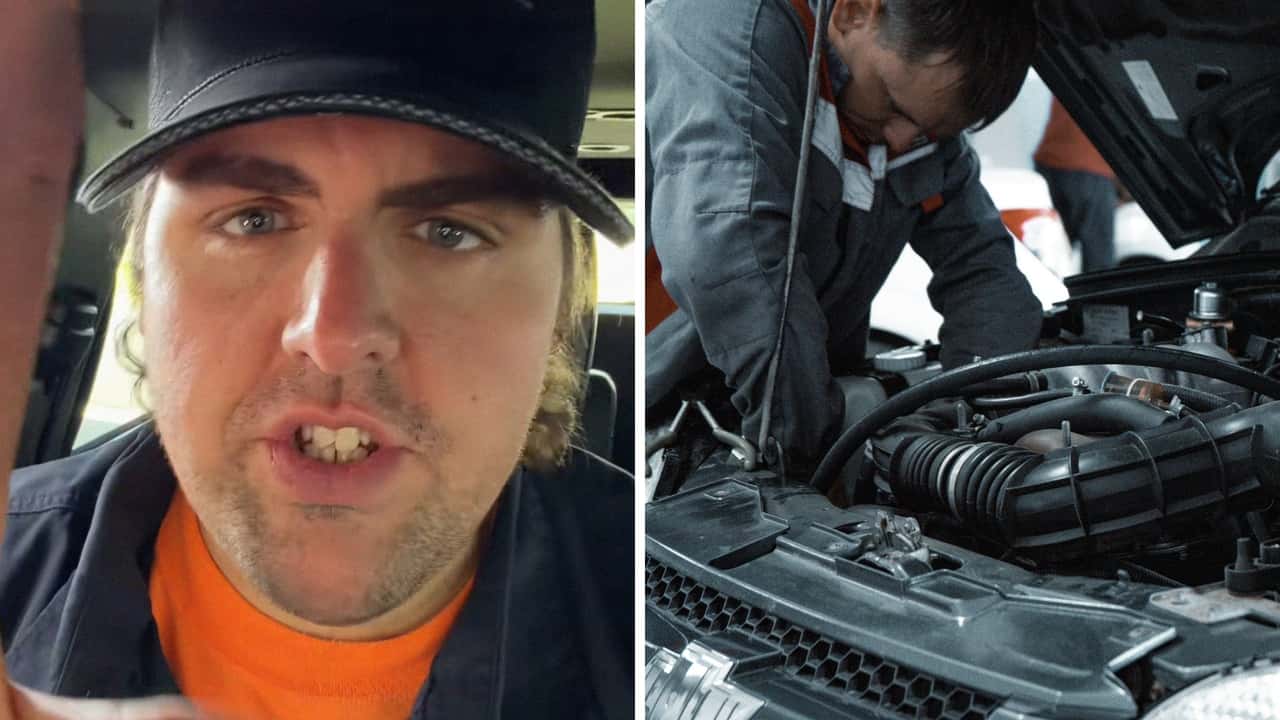 Mechanic works on car.jpg