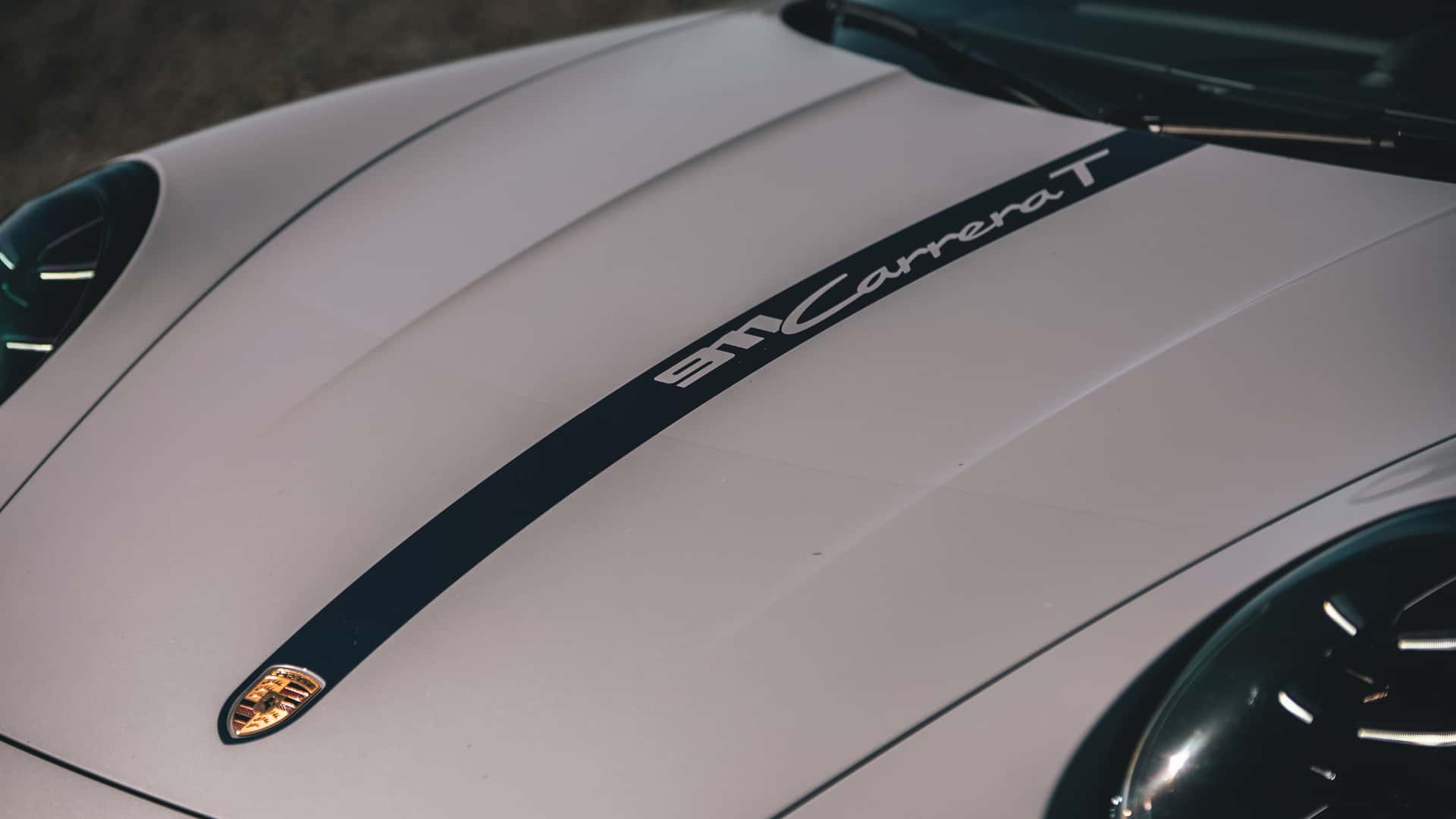 https://cdn.motor1.com/images/mgl/9m8Jvv/s1/2026-porsche-911-carrera-t-review.jpg