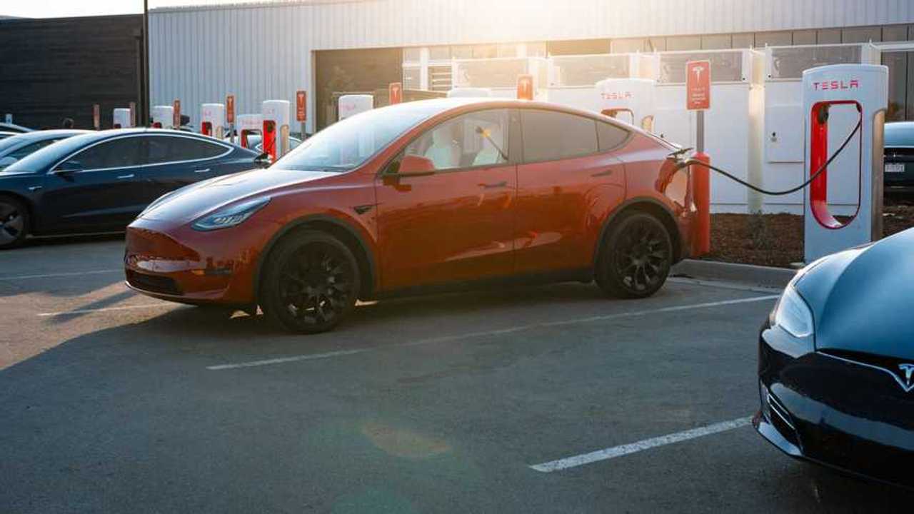 Tesla charging at Superchargers