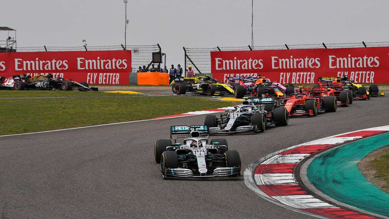 Lewis Hamilton, Mercedes AMG F1 W10, leads Valtteri Bottas, Mercedes AMG W10, Charles Leclerc, Ferrari SF90, Sebastian Vettel, Ferrari SF90, Max Verstappen, Red Bull Racing RB15, and the rest of the field at the start