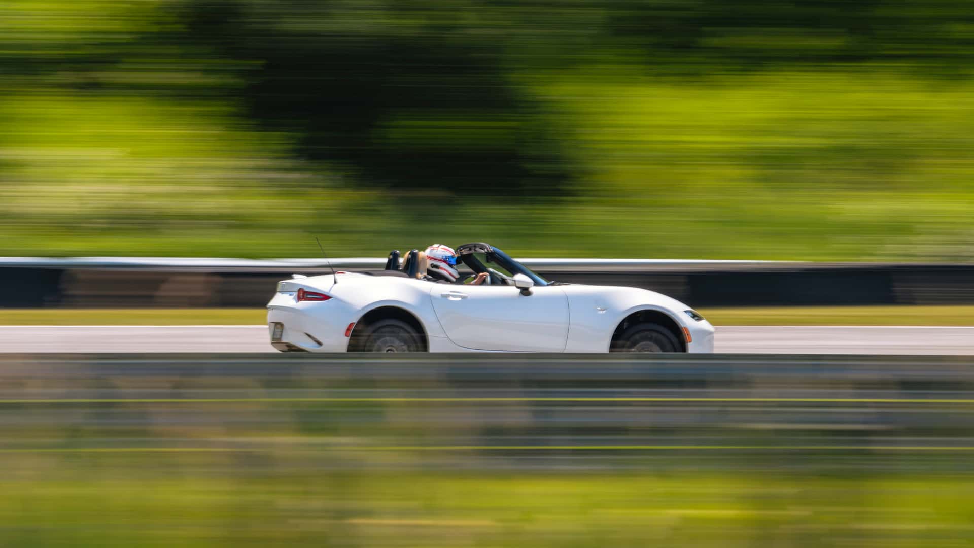 https://cdn.motor1.com/images/mgl/9mQr9y/s1/2024-mazda-mx-5-miata-grand-touring-review.jpg