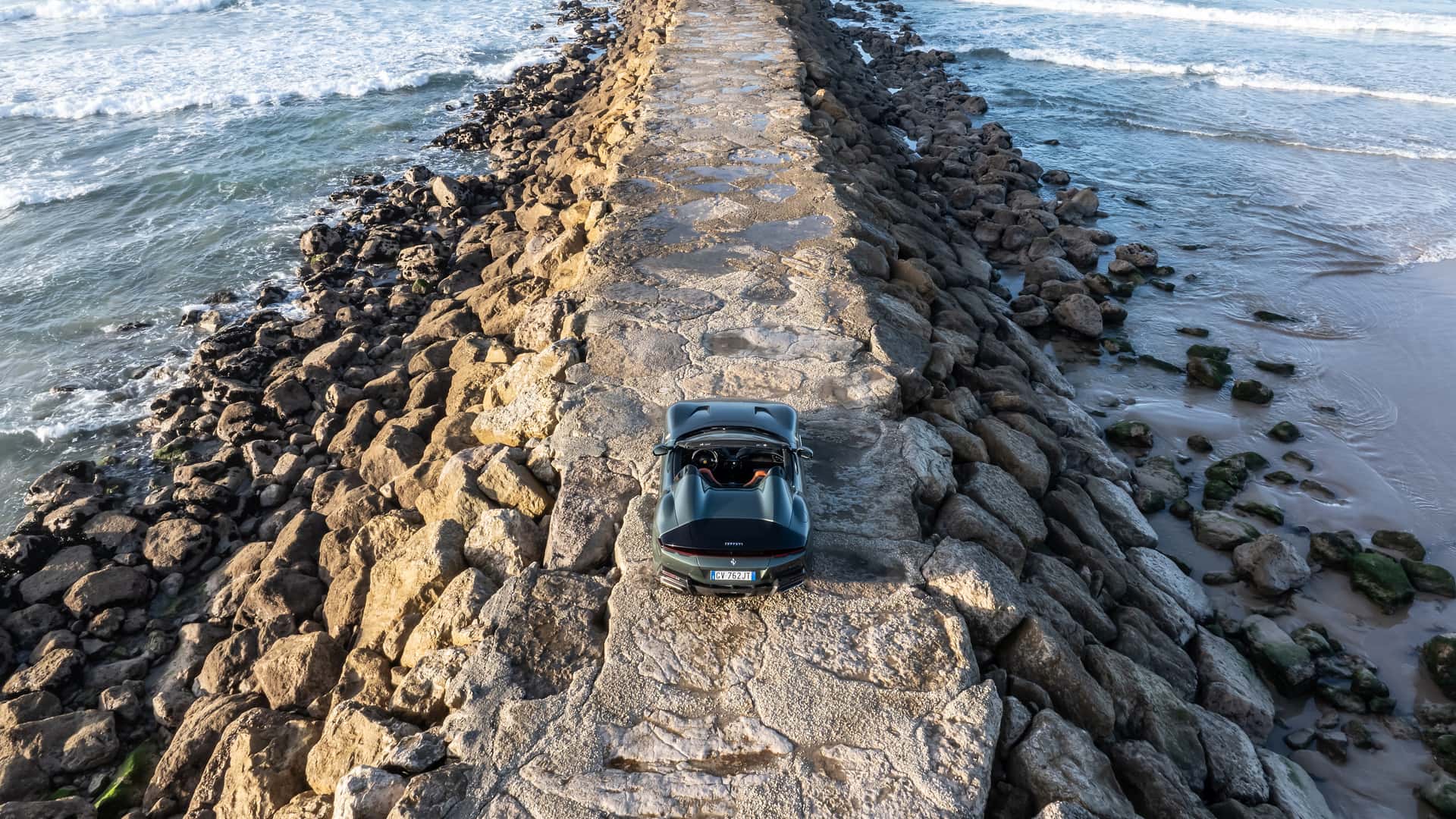 https://cdn.motor1.com/images/mgl/9meZZv/s1/2025-ferrari-12cilindri-spider-first-drive-review.jpg