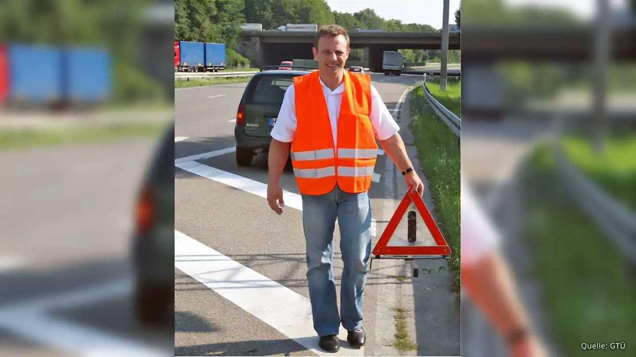 Sicherheitswesten und Warnschilder