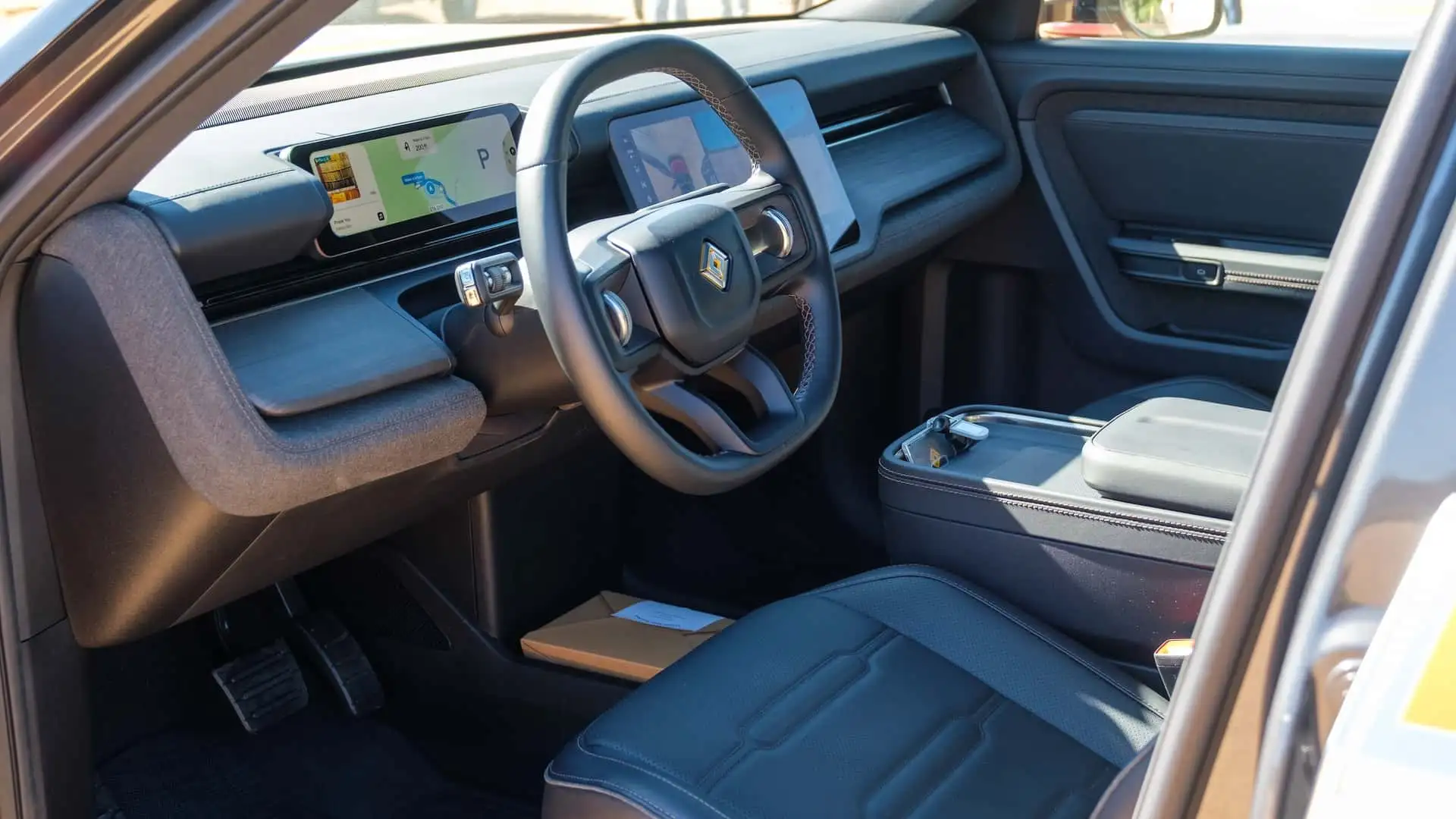 https://cdn.motor1.com/images/mgl/9mpLxl/s1/2026-rivian-r2-prototype-drive.webp