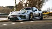 Porsche 718 Cayman GT4 MR Three Quarters On Road