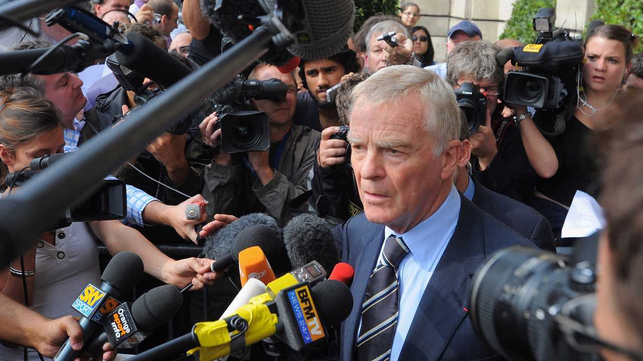 Max Mosley surrounded by press