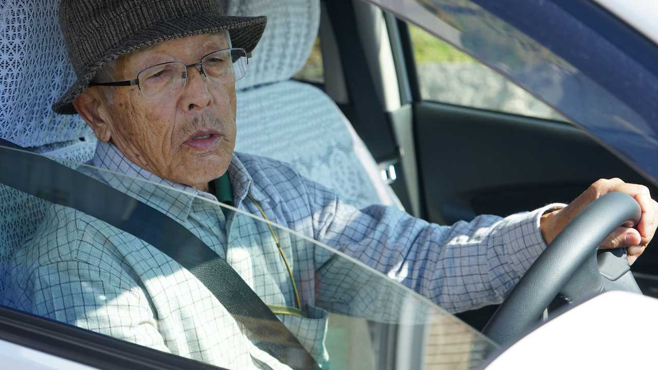Senior man driving a car