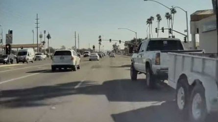 Watch Trailer-Towing Truck Cut Off A Tesla: Truck Driver Flicks Finger