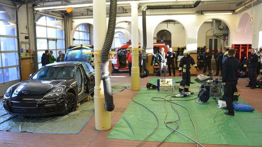 Porsche Panamera being cut apart from the fire brigade