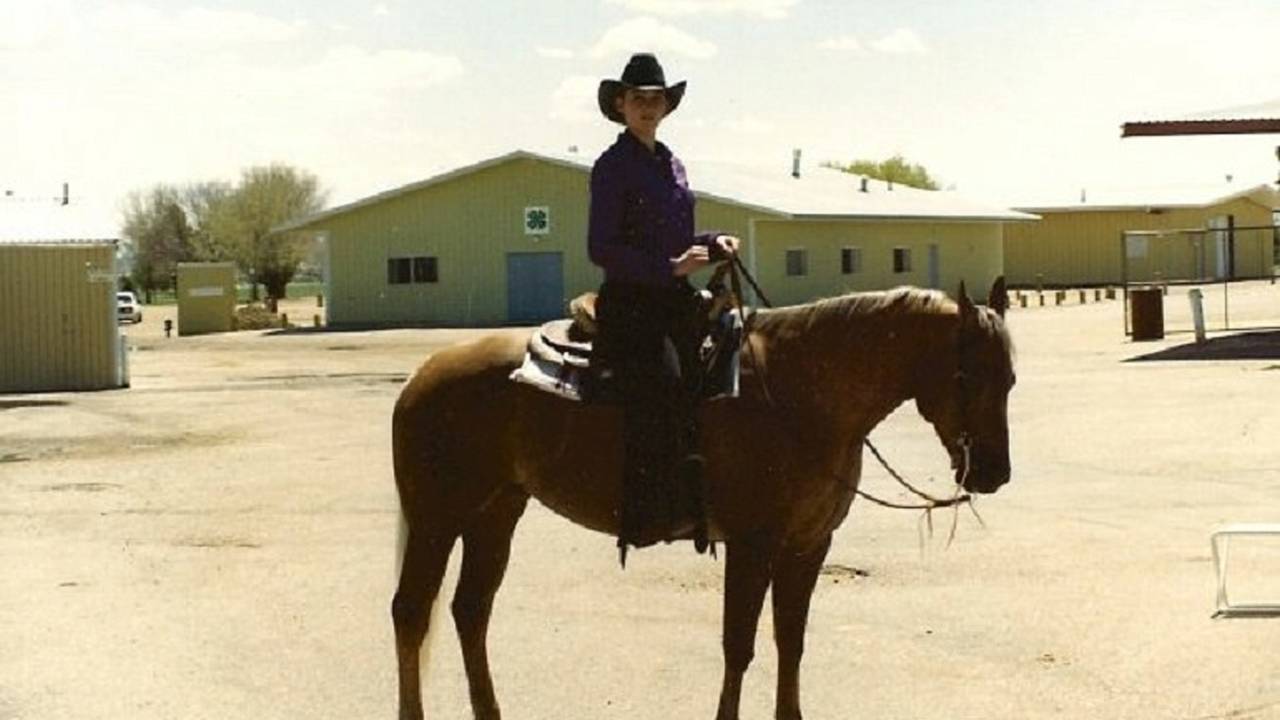 Before learning how to ride two-wheels, Jenn rode horses growing up.