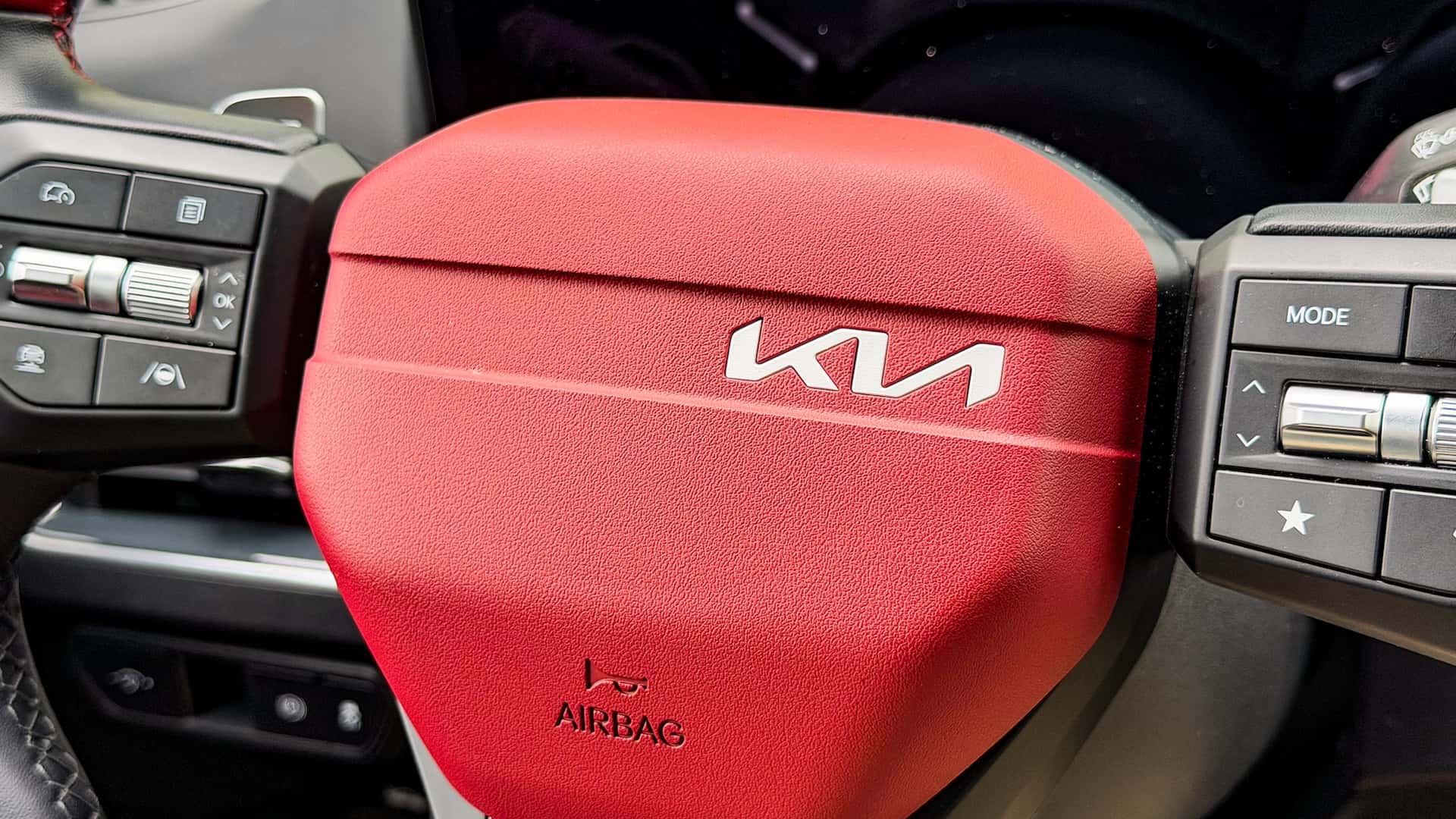 https://cdn.motor1.com/images/mgl/Ak31Qx/s1/2026-kia-k4-hatchback-review.jpg