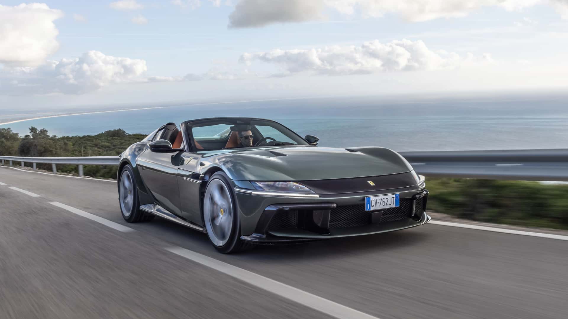 https://cdn.motor1.com/images/mgl/Ak4BB9/s1/2025-ferrari-12cilindri-spider-first-drive-review.jpg