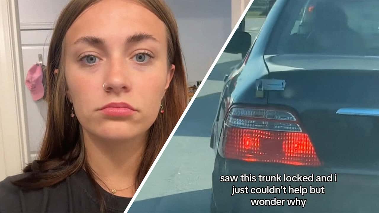 Woman stops at stoplight. Then she notices something unusual about trunk in front of her