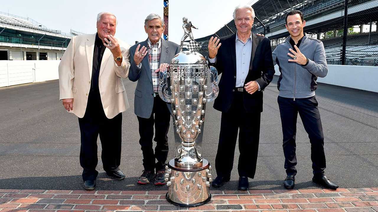 AJ Foyt, Al Unser, Rick Mears, Helio Castroneves with the Borg-Warner Trophy 2021