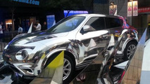 Infiniti ESQ wrapped in chrome