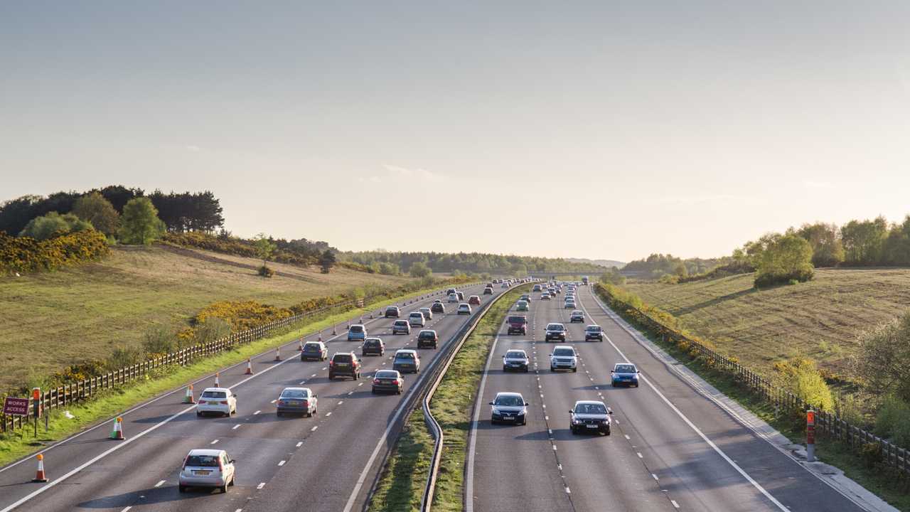 Traffic in Surrey on the A3 motorway Woking UK