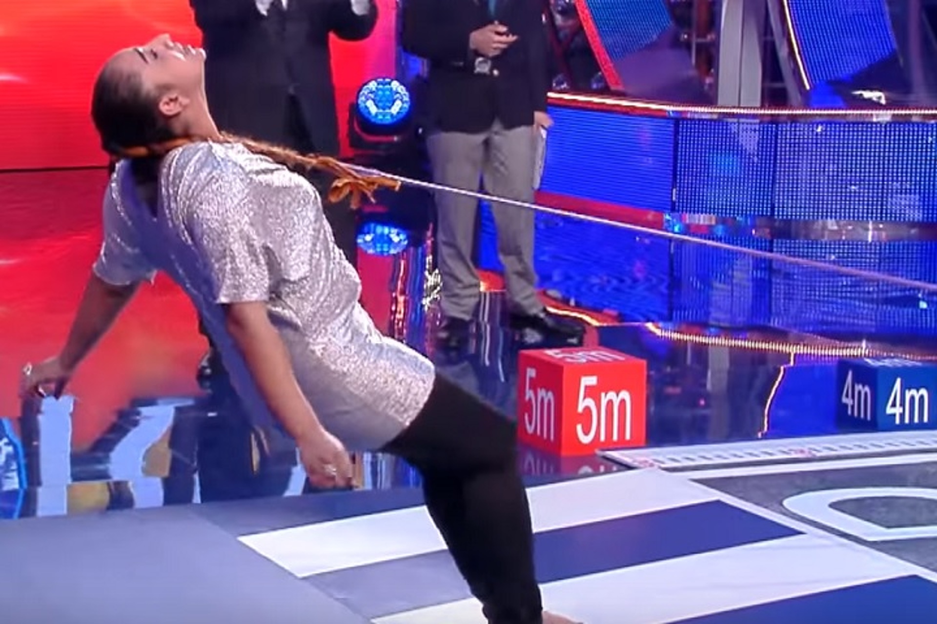 Watch a Woman Pull a Double-Decker Bus With Her Hair