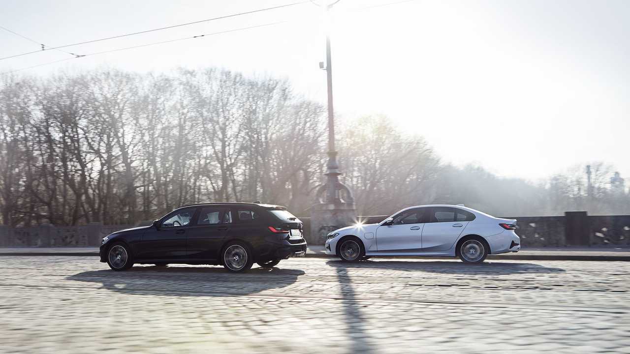 BMW 330e xDrive Touring (on the left)
