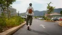 Pure Advance Electric Scooter - Jordan Riding Behind