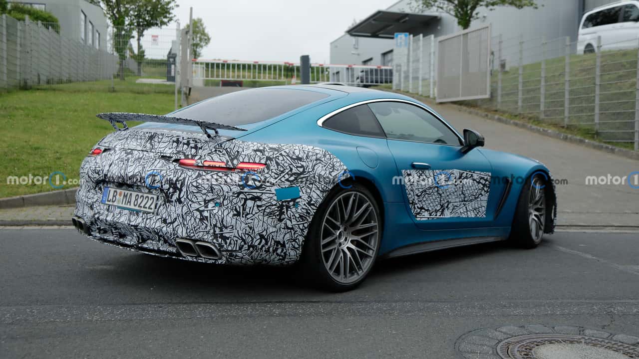 https://cdn.motor1.com/images/mgl/BXQ1Lm/s3/2024-mercedes-amg-gt-coupe-rear-view-spy-photo.jpg