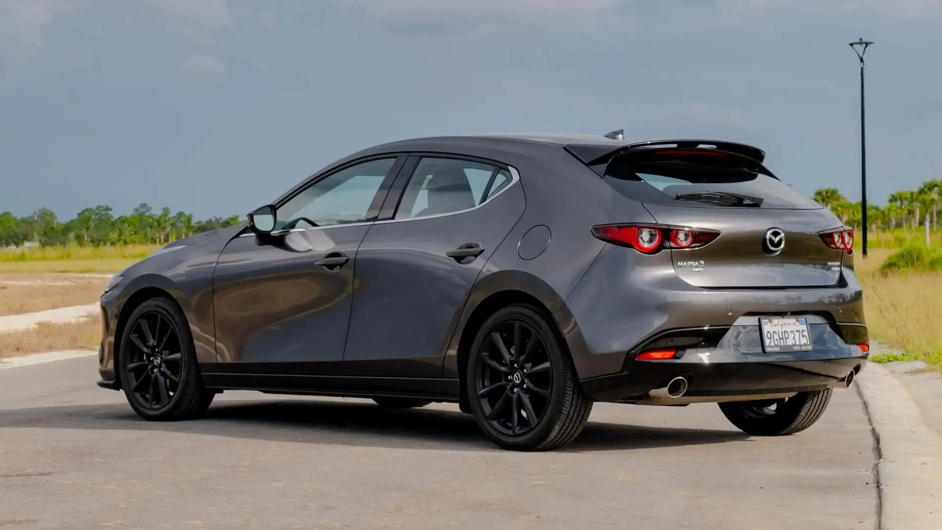 https://cdn.motor1.com/images/mgl/BXxNGM/s1/2024-mazda3-turbo-review.webp