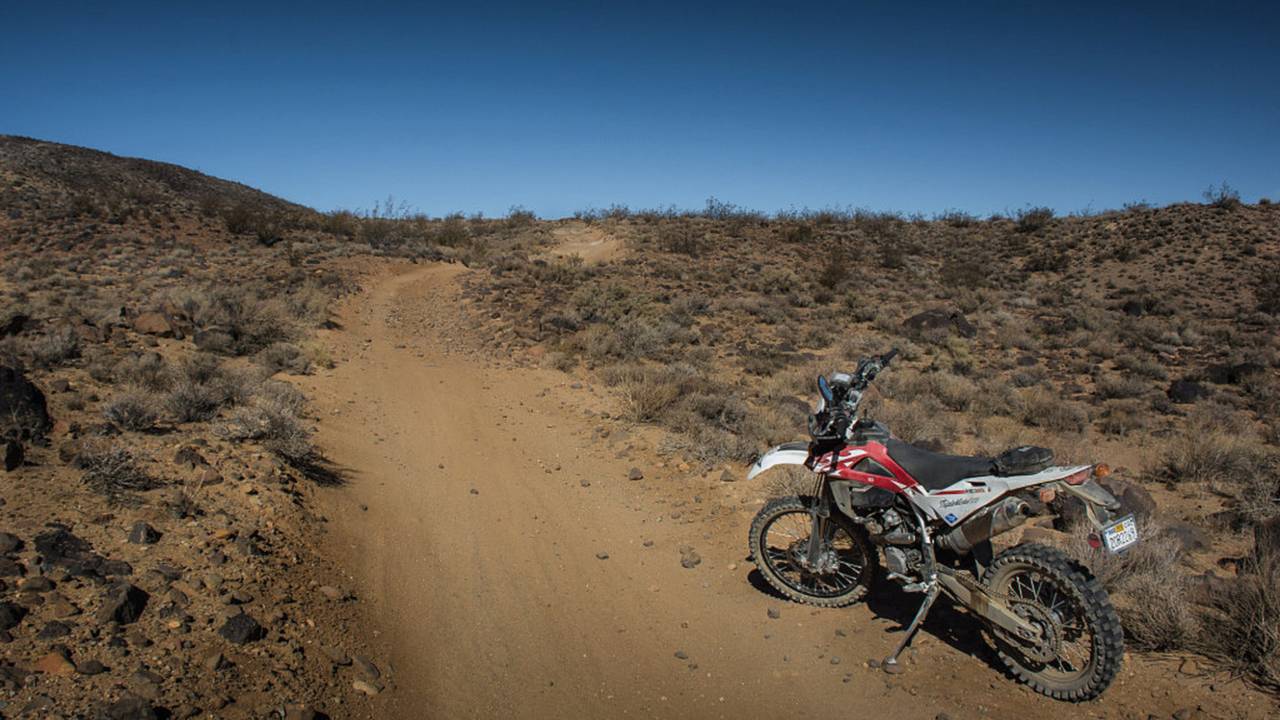 Stacie's Husqvarna TE310 is built for this kind of riding.