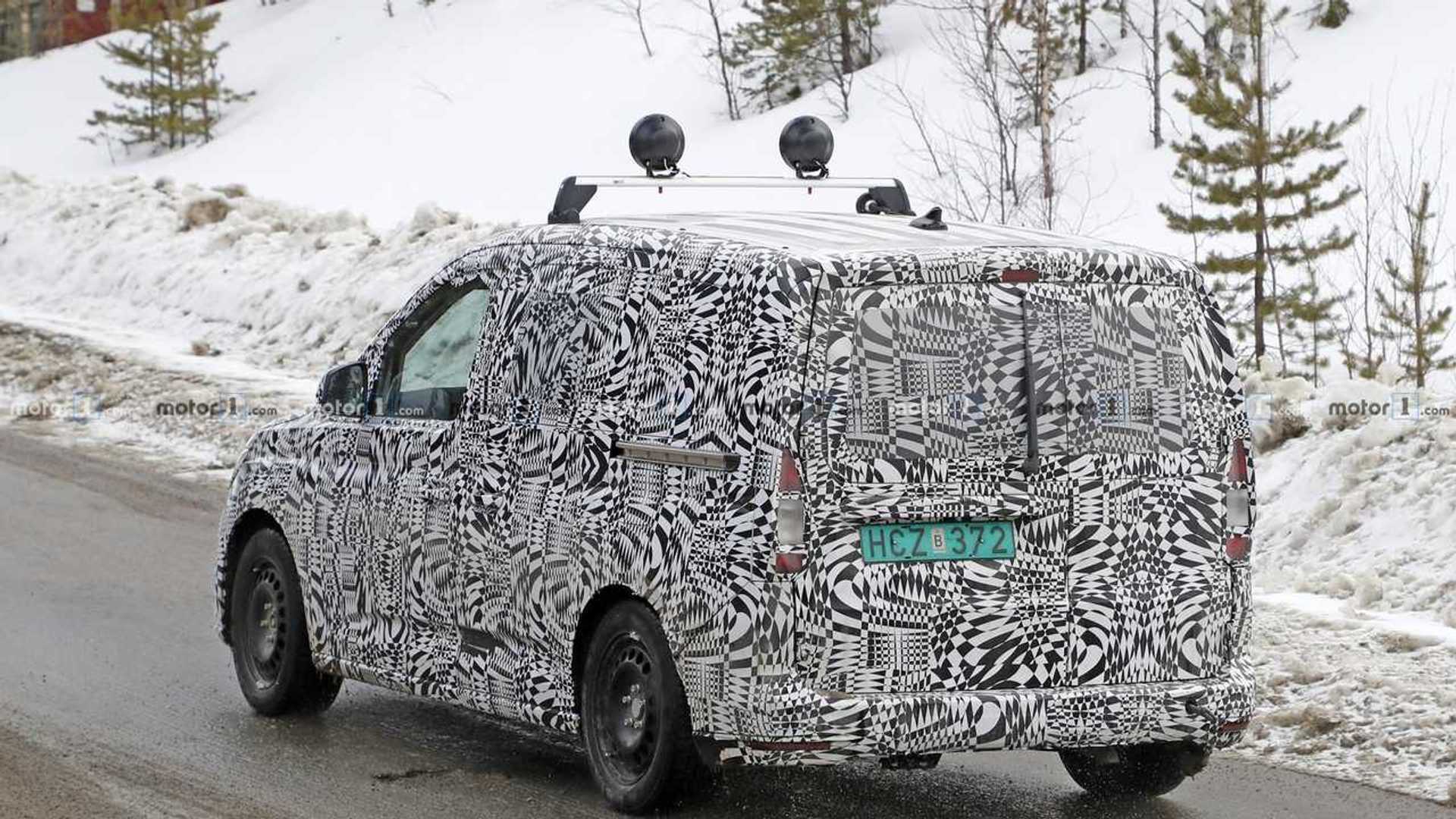 https://cdn.motor1.com/images/mgl/BwzN6/s1/2021-vw-caddy-first-spy-photo.jpg 2021-vw-caddy-first-spy-photo