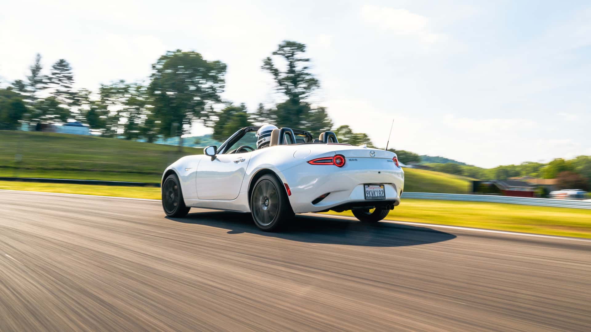 https://cdn.motor1.com/images/mgl/E630we/s1/2024-mazda-mx-5-miata-grand-touring-review.jpg