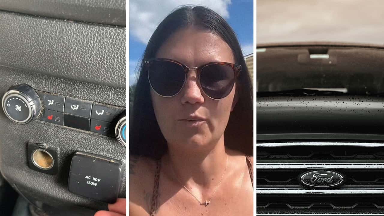 Woman sits in Ford Explorer