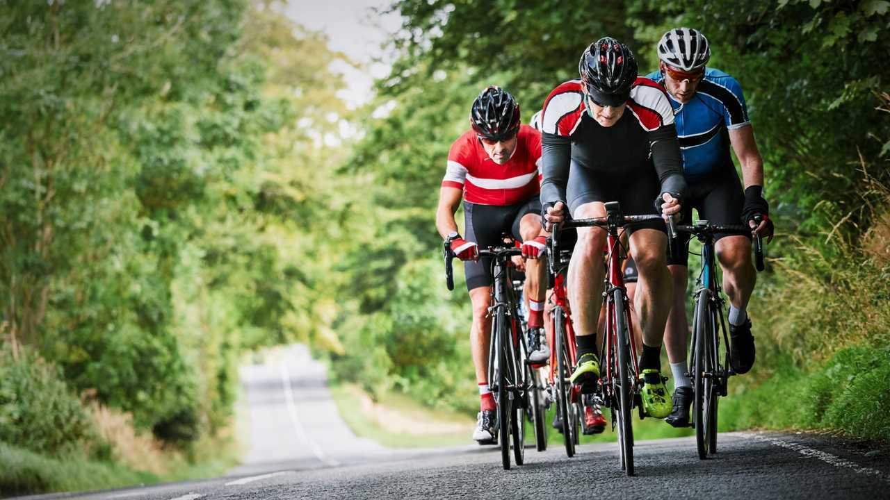 Cyclists racing on country roads in the UK
