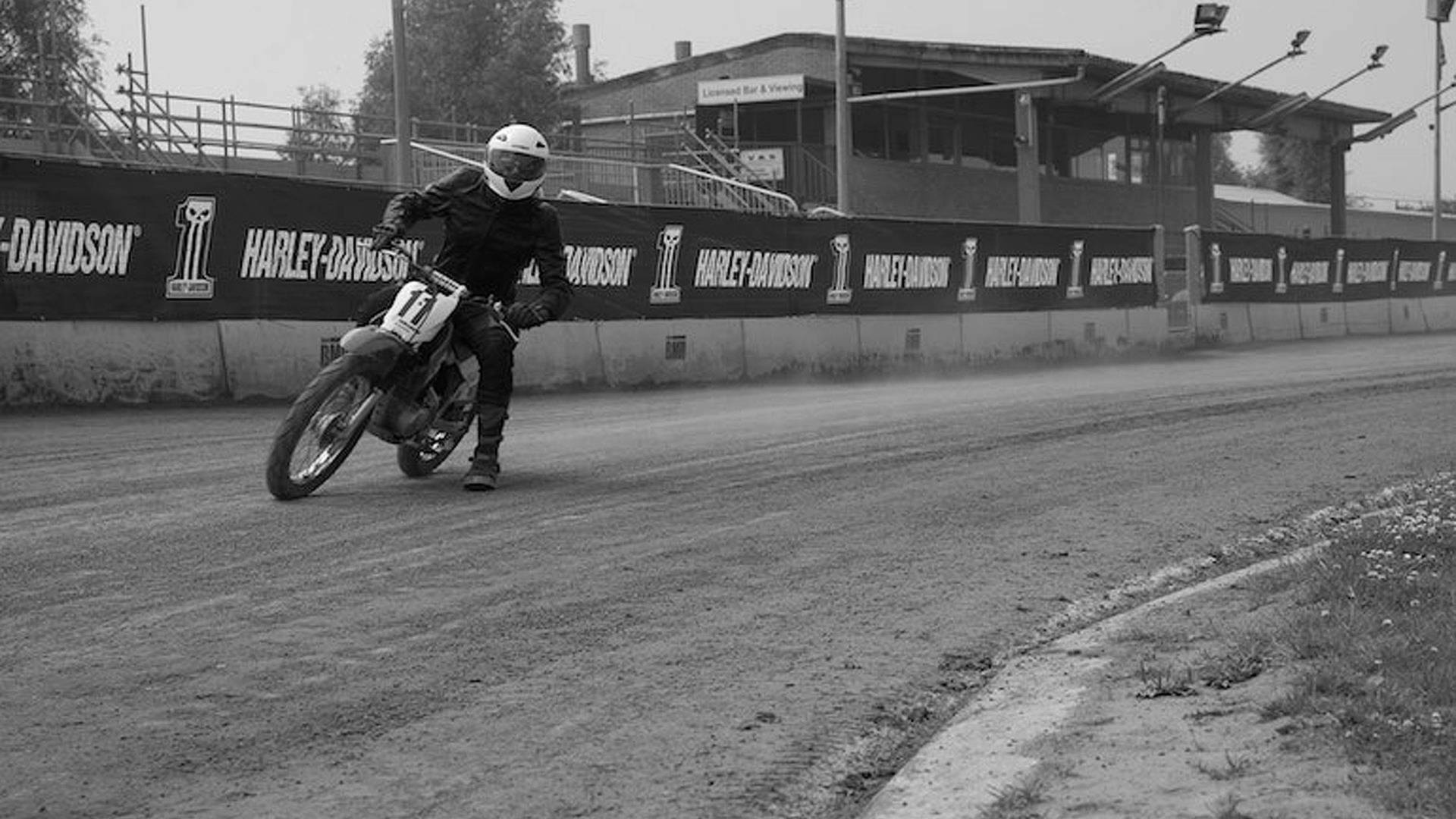 Crashing in Style We Learn to Flat Track