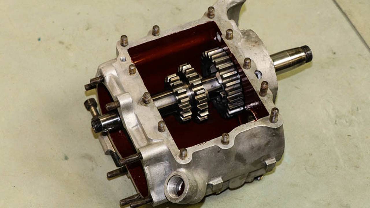 Transmission case with mainshaft, main drive gear and slider gear installed.
