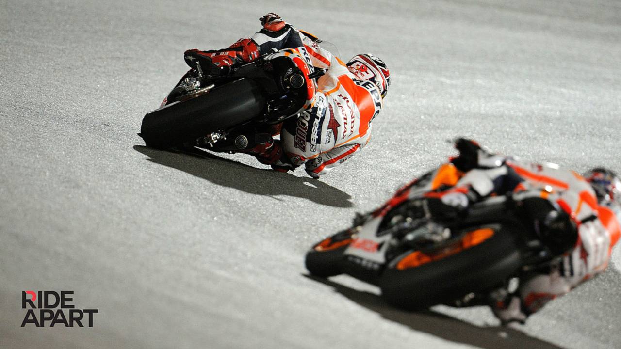 Marquez being pursued (unsuccessfully) by Pedrosa at Losail.