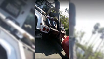 Owner of Nissan Altima tries to free his car