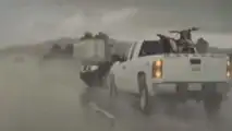 Truck Hydroplanes Into Tesla