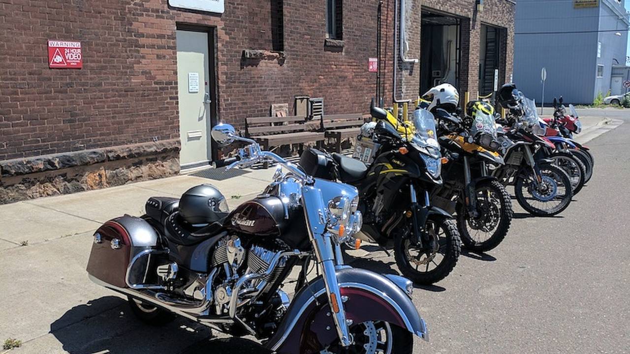 <em>Show up at Aerostich HQ and you can expect to find plenty of two-wheeled visitors. (Thanks to Indian Motorcycle for lending me the Springfield I used to travel up to Duluth.)</em>