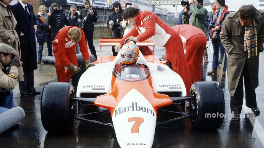 John Watson, McLaren MP4-1-Cosworth with Ron Dennis in the pitlane