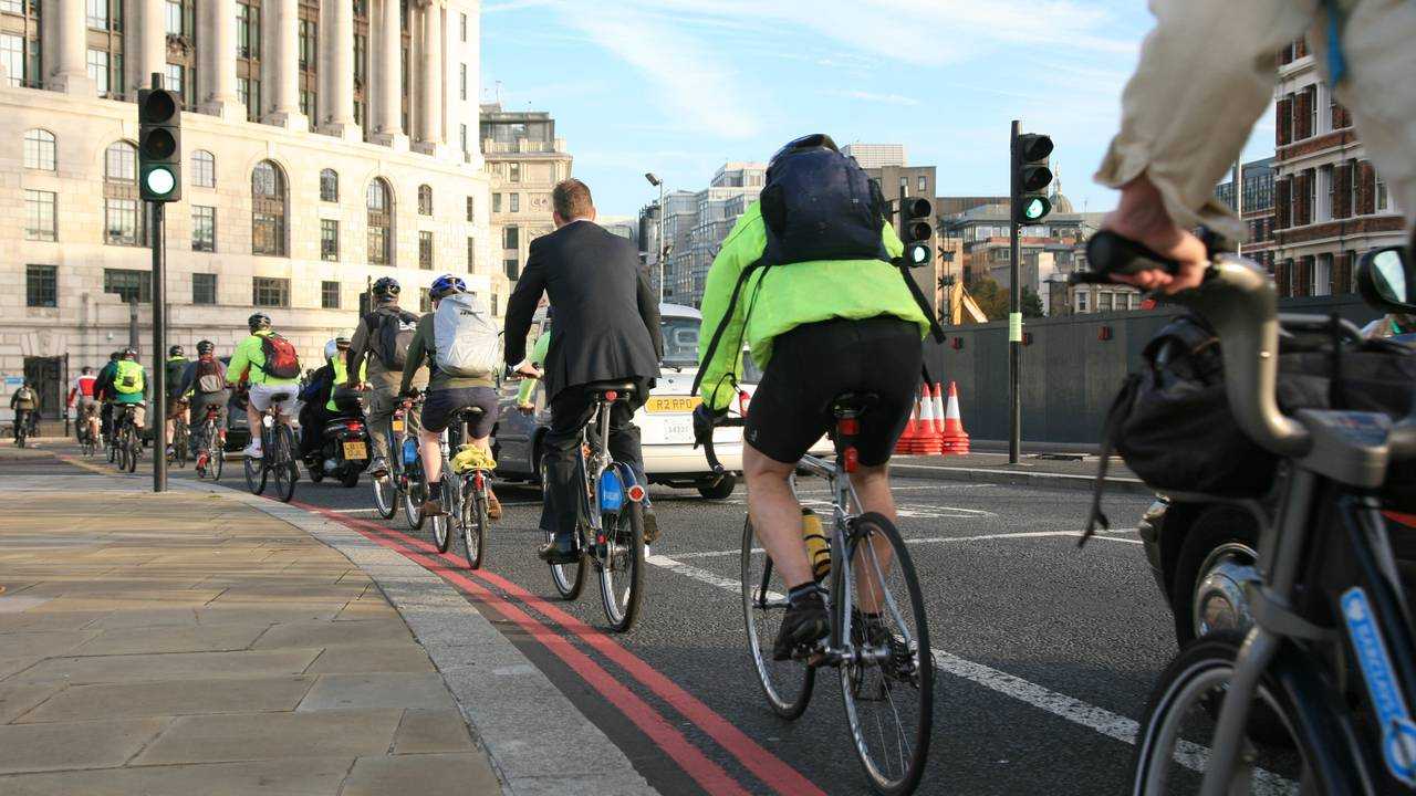 Commuters on bikes in London