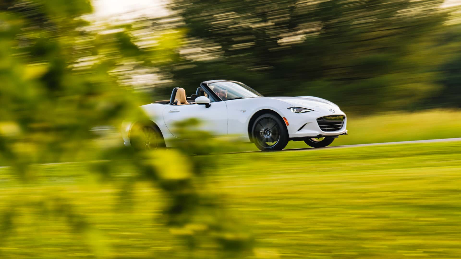 https://cdn.motor1.com/images/mgl/Kb7xnA/s1/2024-mazda-mx-5-miata-grand-touring-review.jpg