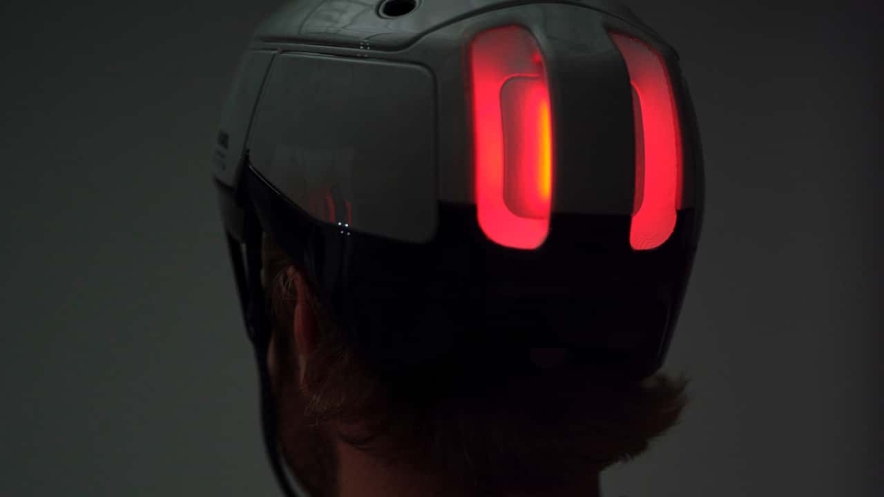 Rivian’s e-Bike Offshoot Debuts a Smart Helmet With Headlights and Brake Lights