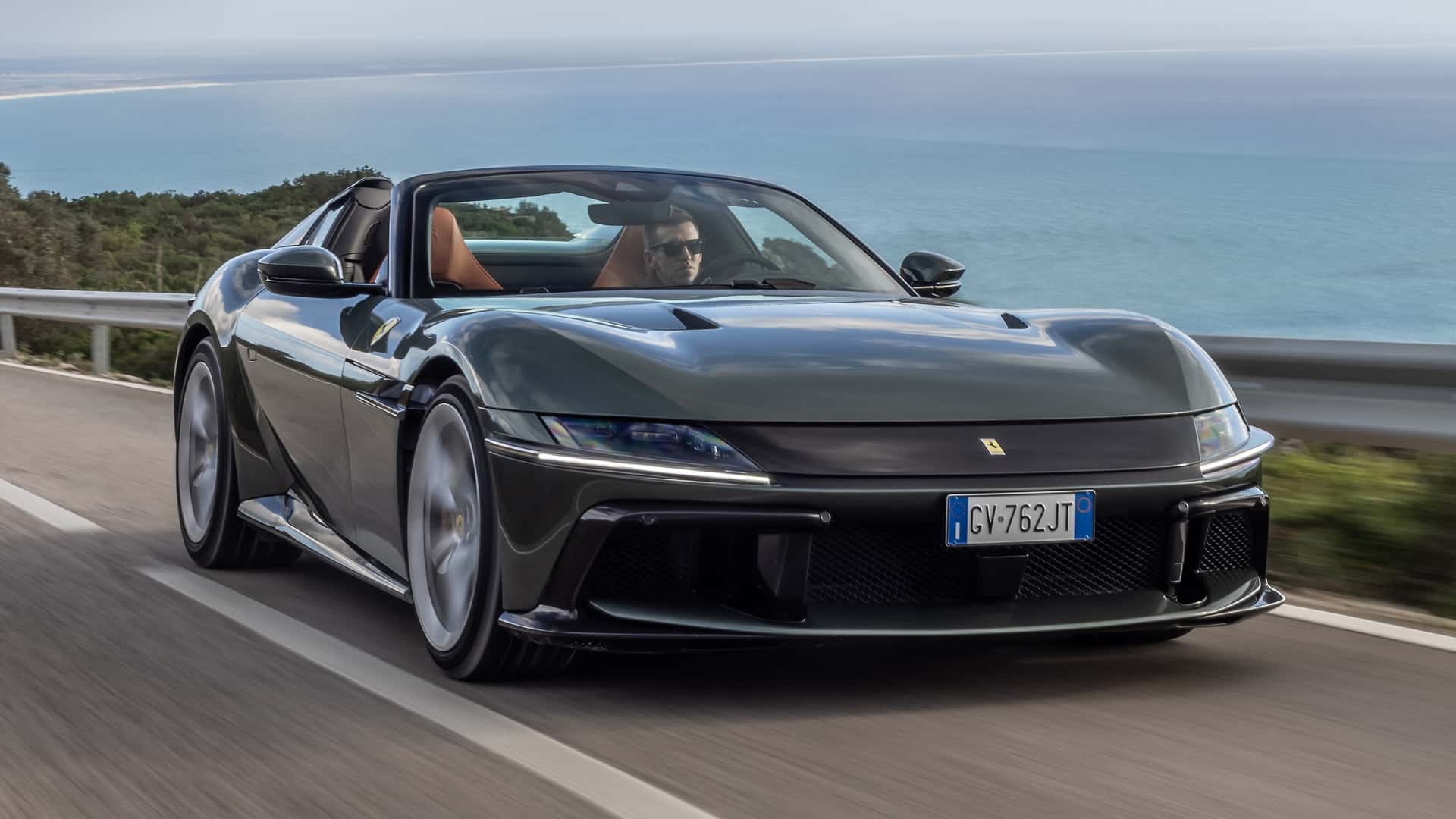 https://cdn.motor1.com/images/mgl/KbYJJN/s1/2025-ferrari-12cilindri-spider-first-drive-review.jpg