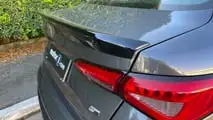Avaliação Fiat Cronos Drive 1.3 AT 2026 - traseira com spoiler